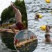 Joyful Parisians take a historic plunge into the Seine River after 100 years