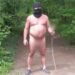 Naked man wearing only balaclava and plastic clogs — and carrying sex toy on stick — terrifies European tourists