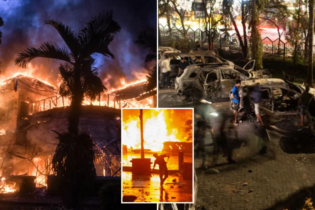 3 dead after mob sets fire to Indonesian regional parliament building