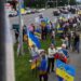 Alaskans greet Putin with thousands of Ukrainian flags, protest ‘war criminal hanging out here’