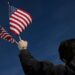 Man burns U.S. flag near White House to protest Trump order
