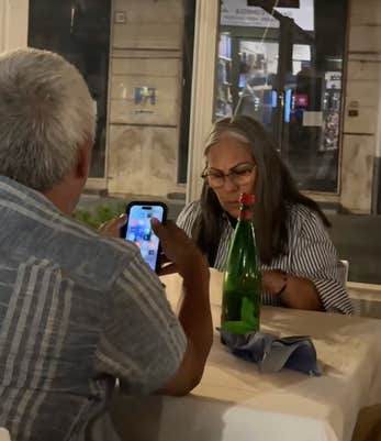 The married man in the clip is seen messaging a woman on the chat platform Wingtalks during dinner with his wife. “I love you my beautiful. I love you with all my heart,” he wrote. 
