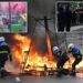 200 arrested in France as protesters clash with police