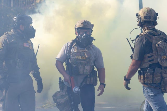 ICE accidentally tear gases Chicago police during clash with protesters