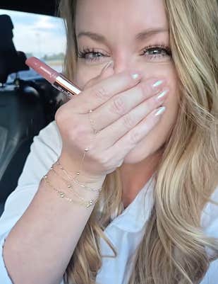 @samanthawlipedema/TikTok applying lip gloss post lip flip procedure