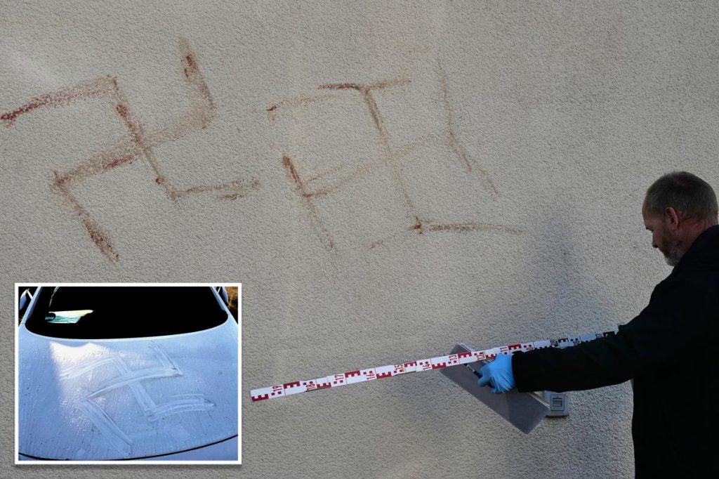 German man accused of painting swastikas on multiple buildings, nearly 50 cars using own blood