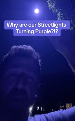 @evanlovett/TikTok under bluish purple streetlight at night "why are our streetlights turning purple?1?"