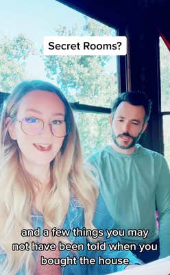 A couple sitting at their window reading a mysterious letter. Text overlay reads, "and a few things you may not have been told when you bought the house."