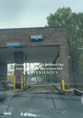 @p_west_/TikTok drive thru bank in the USA with onscreen text, "proving to my british husband that americans aren't lazy we just like convenience."
