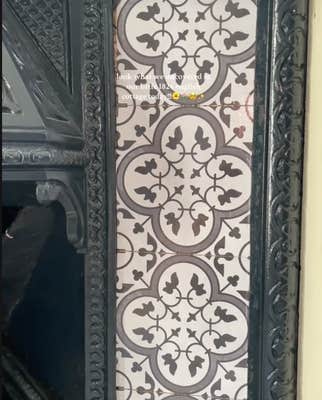@leahsetherealcottage/TikTok  vinyl sticker covering vintage tile. “Look what we uncovered in our little 1826 English cottage today!!!!”