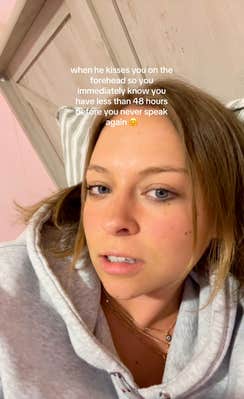 Woman staring at her camera, unamused. Text overlay reads, "when he kisses you on the forehead so you immediately know you have less than 48 hours before you never speak again."
