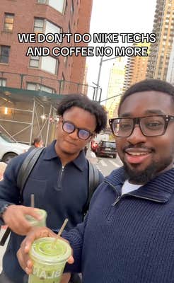 Two Black men in quarter-zip sweaters drinking iced matcha outside in the cold.