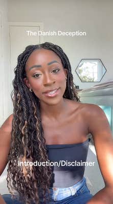 A Black woman sitting down in a sunny room to talk to her camera. She looks earnest as she speaks. Text overlay reads, "Introduction/Disclaimer"