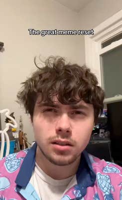 A man in a brightly-colored shirt looking confused off-camera. Text overlay reads, "The great meme reset."