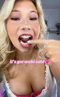 girl with crooked teeth with onscreen text "it's got wabi sabi"
