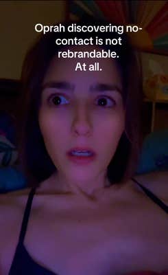 A woman in dark lighting looking faux-concerned. Text overlay reads, "Oprah discovering no-contact is not rebrandable. At all."