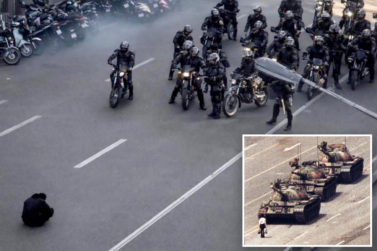 Powerful image of lone Iranian protester in front of security forces draws parallels to Tiananmen Square ‘Tank Man’